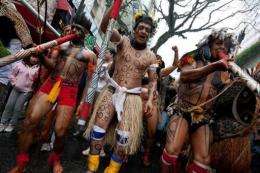 Representatives of indigenous tribes carry out a demonstration in Sao Paulo against the construction of Belo Monte dam