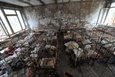 Rusted wrought-iron bed's are pictured in a kindergarden in the ghost city of Pripyat, a few kilometres from Chernobyl