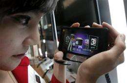 SKorea's LG touts Optimus 3D smartphone for gaming (AP)