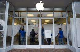 Steve Jobs was honored online and off Wednesday as the company's shops closed temporarily for workers to mourn his loss