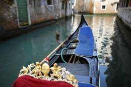 Tens of thousands of tourists visit Venice every day