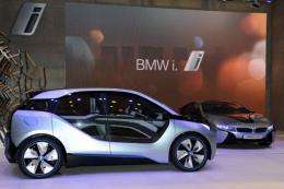 The BMW i3 concept (L) and the BMW i8 concept (R) are on display at the 42nd Tokyo Motor show