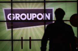The Groupon logo is displayed in the lobby of the company's international headquarters in Chicago