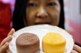 The mooncakes come in two flavours -- chocolate, and mango and pomelo