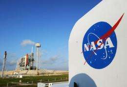The NASA logo is shown at Kennedy Space Center