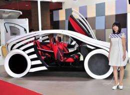 Toyota affiliate Toyota Boshoku displays a study model of a 'T-Brain' four seater car at the Tokyo Motor Show today