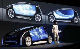 Toyota unveils high-tech concept car ahead of show (AP)
