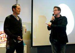Twitter co-founder Biz Stone (R) and CEO Evan Williams
