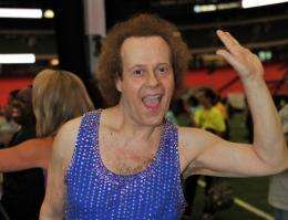 US fitness guru Richard Simmons, who has featured in an Air New Zealand in-flight safety video