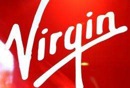 Virgin Media said it had agreed a deal with Sweden's Spotify to offer music streaming services