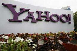 Yahoo 1Q results top analyst views; stock climbs (AP)