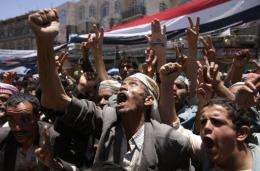 Yemeni anti-government protesters attend a demonstration in Sanaa