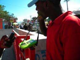 Providing work for Haitians with a phone call