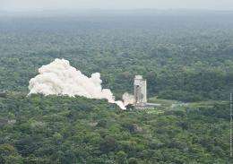 Ariane 5 booster roars into life