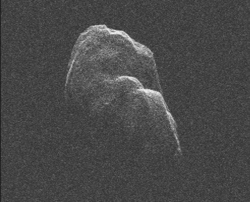 Asteroid Toutatis slowly tumbles by earth