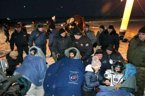 Astronauts touch down in chilly Kazakhstan steppe