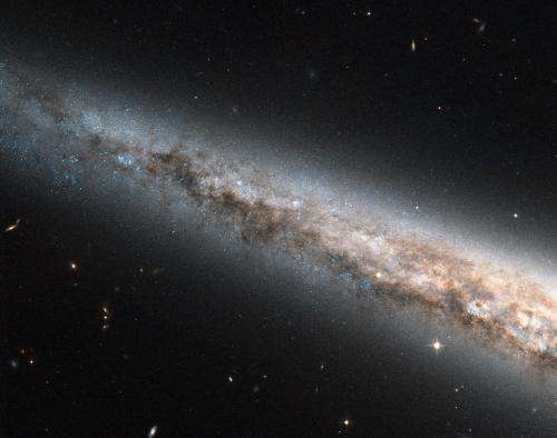 Hubble sees the needle galaxy, edge-on and up close