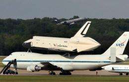 The space shuttle Enterprise sits atop a NASA 747 shuttle carrier aircraft