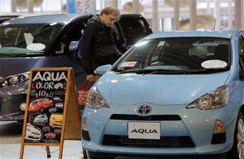 Toyota quarterly profit triples, raises forecast