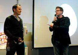 Twitter co-founders Biz Stone (R) and CEO Evan Williams