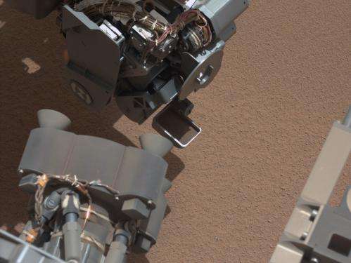 Mars rover Curiosity scoops, detects bright object