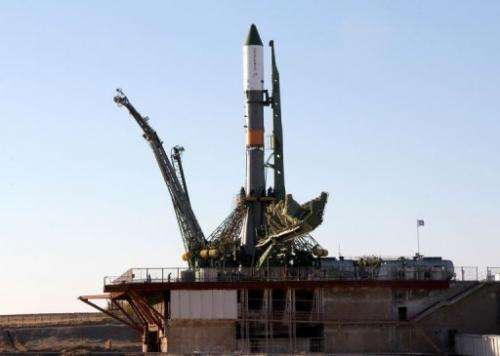 A Russian Soyuz-U booster carrying an unmanned cargo spacecraft Progress