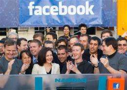 Facebook stock finishes flat in debut (AP)