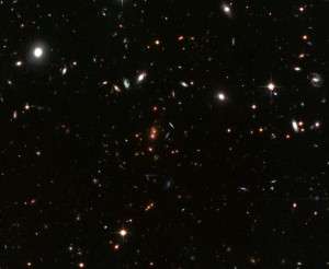 Galaxies in the thick of it grow up fast