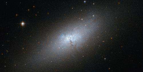 Hubble spots a peculiar compact blue dwarf galaxy