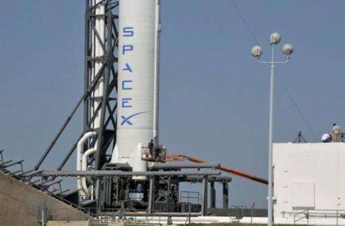 SpaceX's Falcon 9 rocket, carrying the unmanned Dragon capsule, at Cape Canaveral Air Force Station