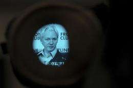 WikiLeaks founder Julian Assange is pictured through a camera viewfinder in London on February 27