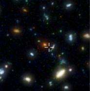 Astronomers pinpoint elusive galaxy - and find it is not alone