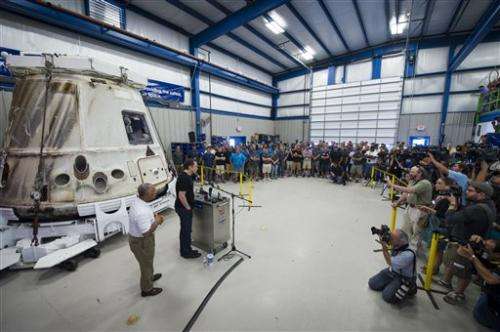 NASA chief views history-making SpaceX capsule