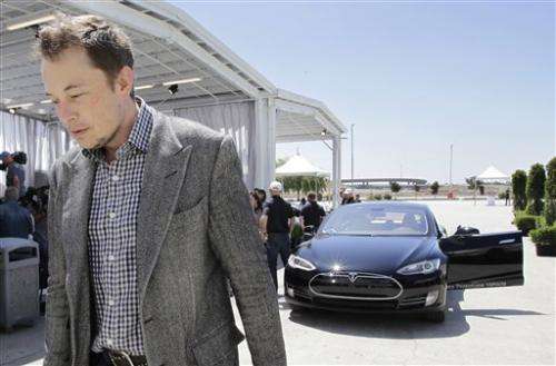 First Tesla electric sedans hit the road