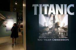 Members of the press view exhibits during a media preview of a new exhibit "Titanic: 100 Year Obsession"