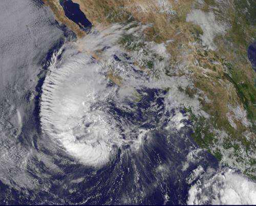 Satellite sees Miriam weaken to a tropical storm