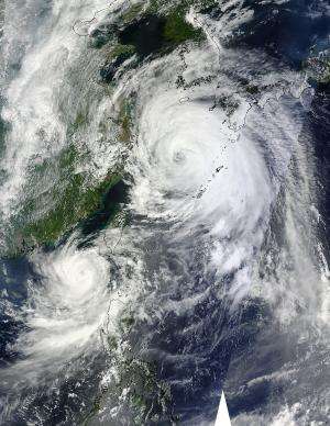 NASA sees Typhoon Bolaven dwarf Typhoon Tembin