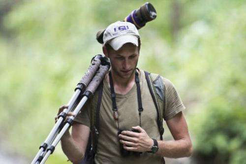 A birdwatcher takes part in the Birding Rally Challenge near the Machu Picchu sanctuary in Cuzco on December 5, 2012