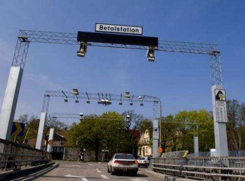 A car passes a congestion tax control point in Stockholm on May 12, 2006