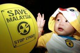 A child is seen during a protest against Lynas Corporation in Kuantan