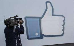 A debate: Should you jump in on Facebook debut? (AP)