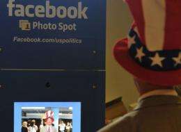 A delegate poses in the Facebook photo booth during Republican National Convention