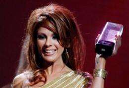 Adult film actress Kirsten Price accepts an award at a ceremony in Las Vegas
