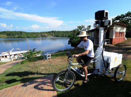 A Google team member rides a Trike with a 360-degree camera system on it, to record the "Street View for the Amazon"