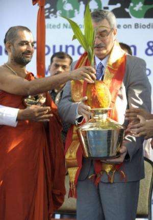 A Hindu religious priest (left) at the launch of the world's first 'Green Kumbh Yatra' for Biodiversity