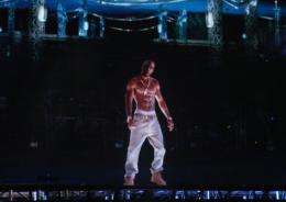 A hologram of deceased rapper Tupac Shakur performs onstage during the 2012 Coachella Valley Music & Arts Festival
