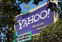 Ailing Internet giant Yahoo! said Tuesday its fourth-quarter net earnings slid 5.3 percent from a year earlier