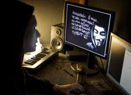 An Anonymous hacker is pictured in Lyon, France