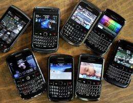 An assortment of Blackberry smartphomes seen at a restaurant in Jakarta