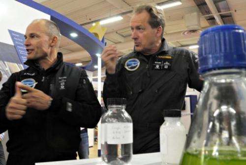 Andre Borschberg (R) and joint founder and president of Solar Impulse project Bertrand Piccard in 2011